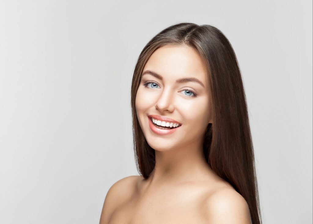 A brilliant, whitened smile, dazzling with radiance and reflecting optimal oral health and aesthetic appeal.